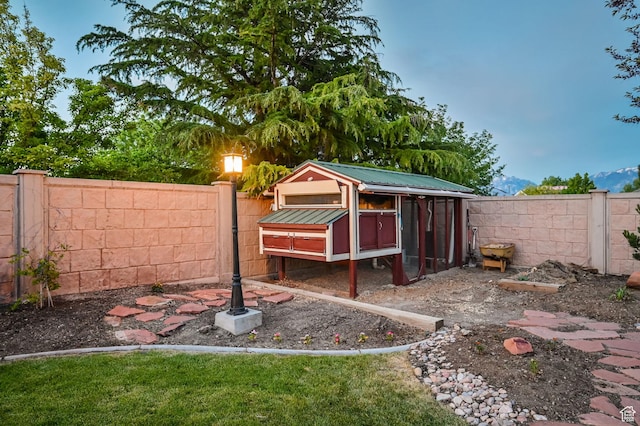 4234 W Swensen Farm Dr S, Riverton, UT 84096 - fenced backyard with exterior structure and an outdoor structure
