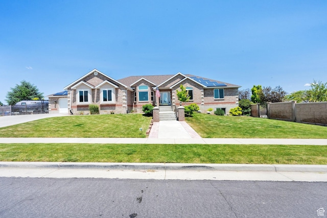 4234 W Swensen Farm Dr S, Riverton, UT 84096 - view of front of home featuring brick siding and solar panels