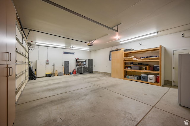 4234 W Swensen Farm Dr S, Riverton, UT 84096 - garage featuring electric panel and a garage door opener