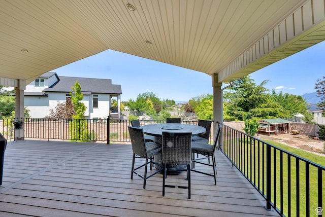 4234 W Swensen Farm Dr S, Riverton, UT 84096 - deck with outdoor dining area and a yard