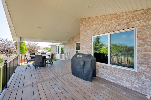 4234 W Swensen Farm Dr S, Riverton, UT 84096 - wooden deck featuring a grill and outdoor dining area