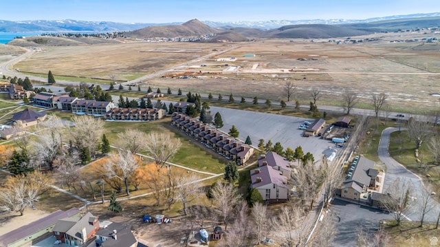 2176 S Bear Blvd Unit 404, Garden City, UT 84028 - aerial overview of property's location with a mountain backdrop and rural landscape