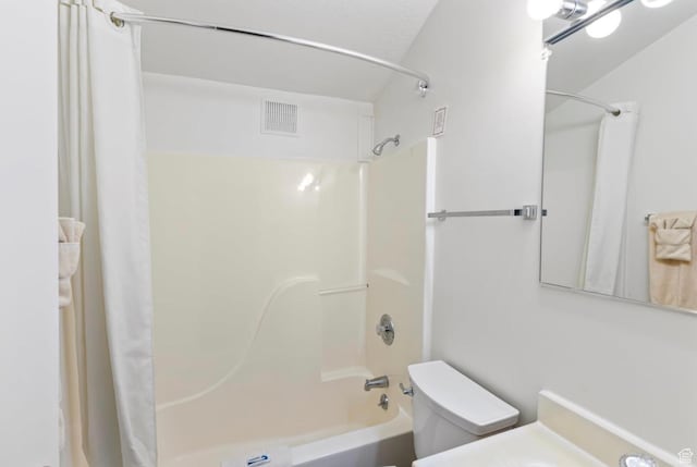 2176 S Bear Blvd Unit 404, Garden City, UT 84028 - full bathroom featuring shower / bathtub combination with curtain, toilet, and vanity