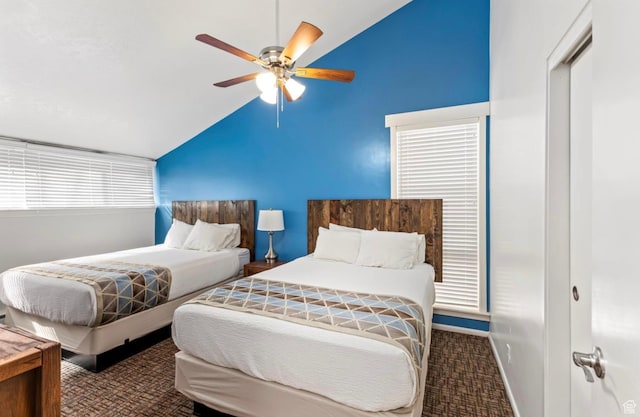 2176 S Bear Blvd Unit 404, Garden City, UT 84028 - bedroom with lofted ceiling, baseboards, carpet floors, and a ceiling fan