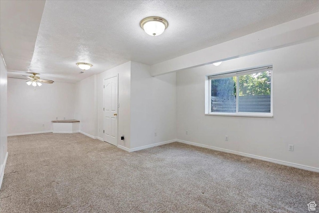5645 S 3600 W, Roy, UT 84067 - unfurnished room with a textured ceiling, carpet floors, baseboards, and a ceiling fan