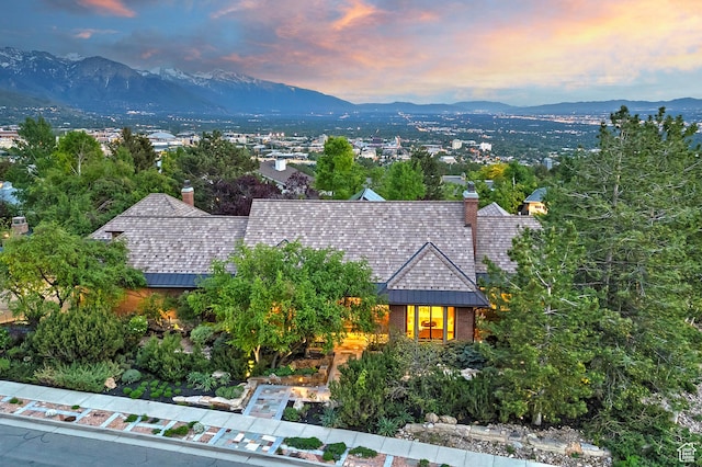 1358 E Tomahawk Dr N, Salt Lake City, UT 84103 - view of front of home with a chimney, a mountain view, and brick siding