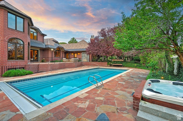 1358 E Tomahawk Dr N, Salt Lake City, UT 84103 - view of pool featuring a jacuzzi and a patio area
