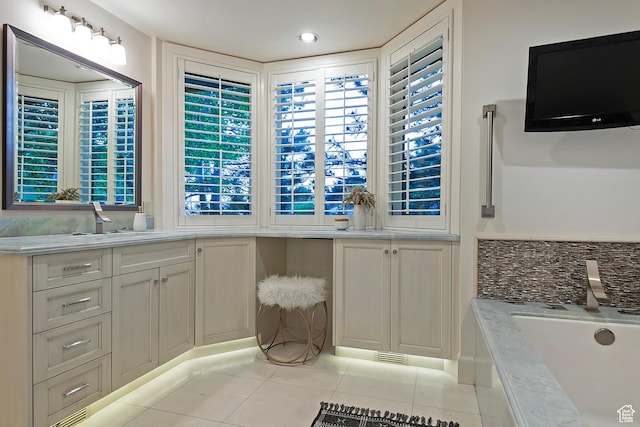 1358 E Tomahawk Dr N, Salt Lake City, UT 84103 - bathroom featuring tile patterned floors, vanity, a garden tub, and recessed lighting