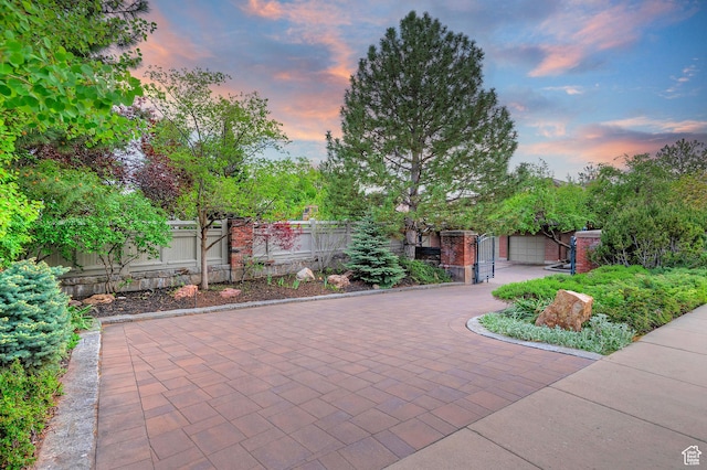 1358 E Tomahawk Dr N, Salt Lake City, UT 84103 - view of front of house with asphalt driveway