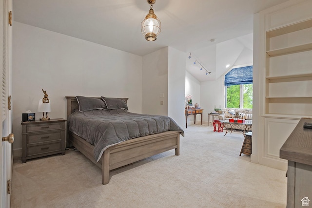 1358 E Tomahawk Dr N, Salt Lake City, UT 84103 - bedroom featuring vaulted ceiling and light carpet