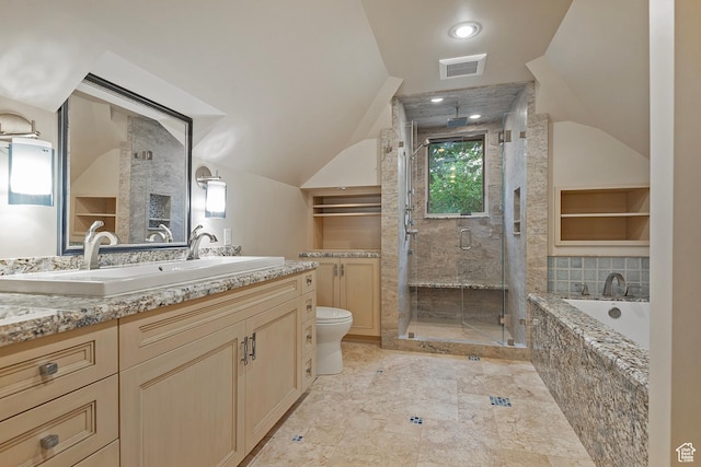 1358 E Tomahawk Dr N, Salt Lake City, UT 84103 - bathroom featuring a shower stall, vanity, lofted ceiling, a garden tub, and toilet