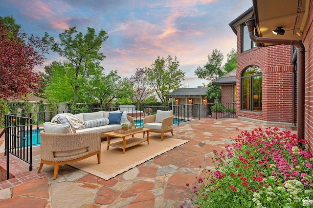 1358 E Tomahawk Dr N, Salt Lake City, UT 84103 - fenced backyard with outdoor lounge area and a patio