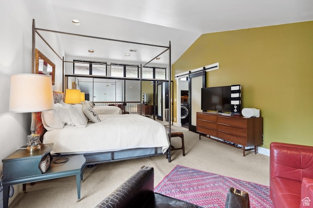 939 S Donner Way Unit 308, Salt Lake City, UT 84108 - carpeted bedroom featuring a barn door, lofted ceiling, and baseboards