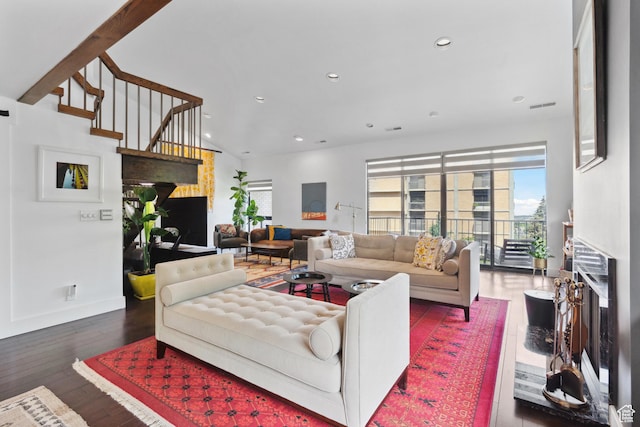 939 S Donner Way Unit 308, Salt Lake City, UT 84108 - living room with hardwood / wood-style floors, recessed lighting, stairway, and a fireplace with raised hearth