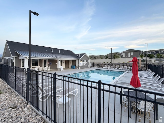 4323 W Burwell Ln, Herriman, UT 84096 - community pool featuring a patio area and a residential view