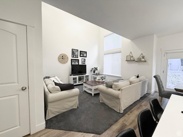 4323 W Burwell Ln, Herriman, UT 84096 - living area featuring wood finished floors and healthy amount of natural light