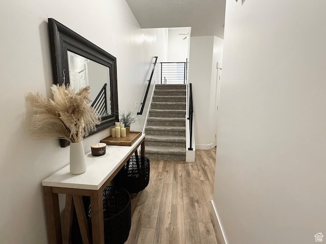 4323 W Burwell Ln, Herriman, UT 84096 - stairs with wood finished floors and baseboards