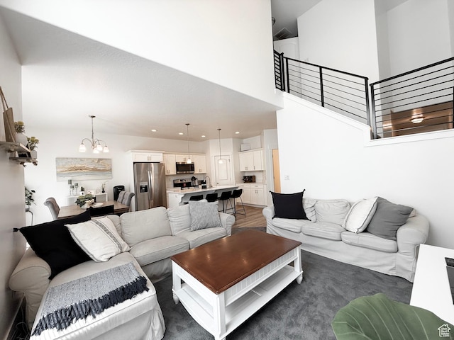 4323 W Burwell Ln, Herriman, UT 84096 - living room featuring a chandelier and a high ceiling