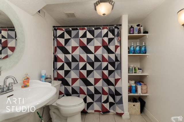1132 E 360 S, Provo, UT 84606 - bathroom featuring tile patterned flooring, toilet, and a shower with shower curtain