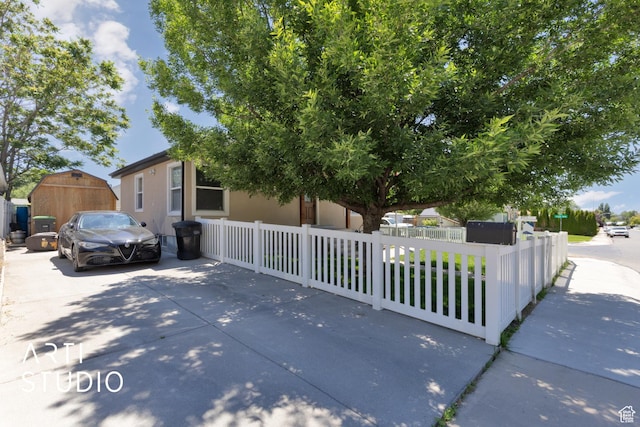 1132 E 360 S, Provo, UT 84606 - view of property hidden behind natural elements with a fenced front yard and a storage shed