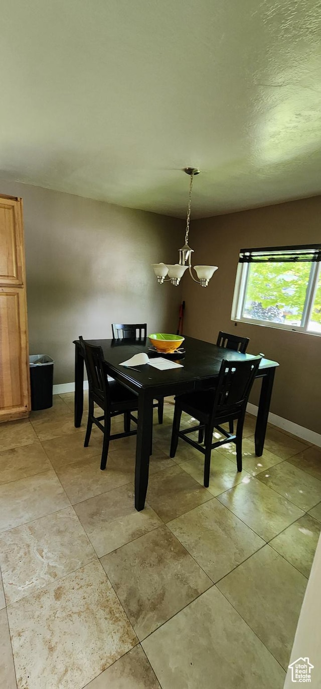 1132 E 360 S, Provo, UT 84606 - dining room featuring baseboards and a chandelier