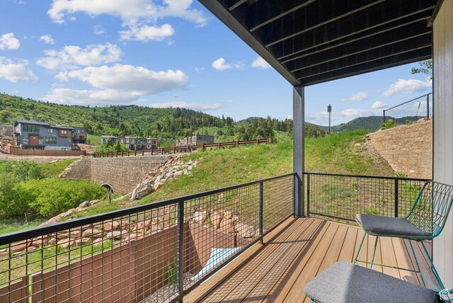 8210 N Toll Creek Ln, Park City, UT 84098 - wooden deck featuring a mountain view and a wooded view
