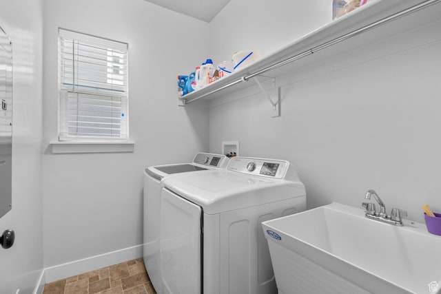 1608 W Gannett Dr, Saratoga Springs, UT 84045 - laundry room with baseboards and washer and clothes dryer