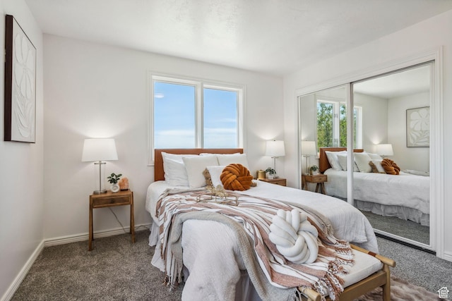 582 S Marialana Way E, North Salt Lake, UT 84054 - carpeted bedroom featuring a closet and baseboards