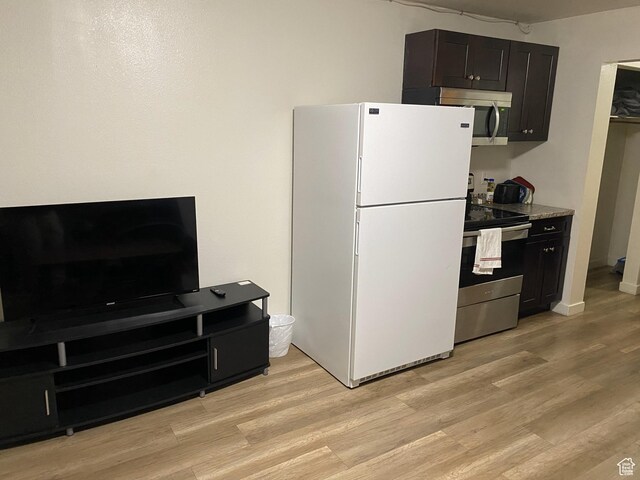 620 W Main St, Green River, UT 84525 - kitchen featuring stainless steel appliances and light wood-style flooring