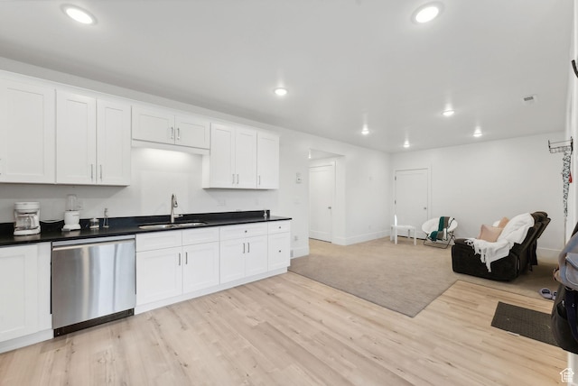 786 S 820 E, Pleasant Grove, UT 84062 - kitchen featuring stainless steel dishwasher, a sink, light wood-style floors, dark countertops, and white cabinetry