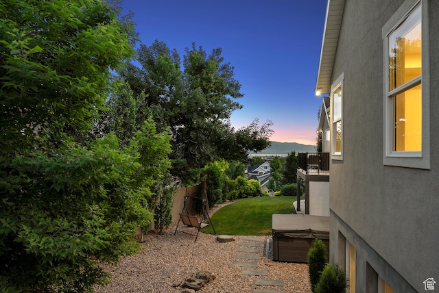 786 S 820 E, Pleasant Grove, UT 84062 - yard at dusk with a hot tub and a lawn