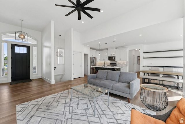 786 S 820 E, Pleasant Grove, UT 84062 - living room featuring wood finished floors, ceiling fan, and recessed lighting