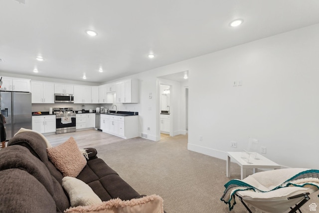 786 S 820 E, Pleasant Grove, UT 84062 - living room featuring baseboards, light colored carpet, and recessed lighting