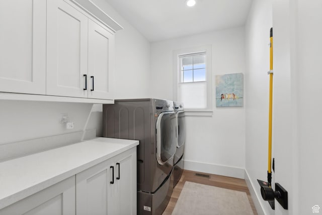 786 S 820 E, Pleasant Grove, UT 84062 - washroom featuring cabinet space, washing machine and dryer, baseboards, light wood-type flooring, and recessed lighting