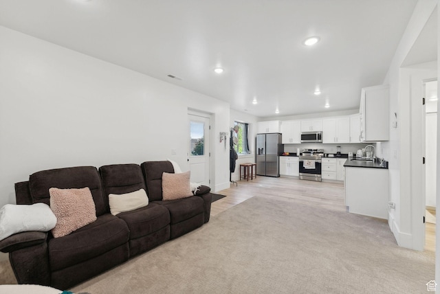 786 S 820 E, Pleasant Grove, UT 84062 - living area with recessed lighting, baseboards, light carpet, and light wood-style flooring