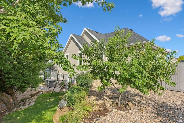 786 S 820 E, Pleasant Grove, UT 84062 - view of property exterior featuring stucco siding and a shingled roof