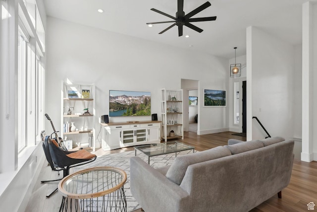 786 S 820 E, Pleasant Grove, UT 84062 - living room featuring a ceiling fan, healthy amount of natural light, a high ceiling, wood finished floors, and recessed lighting