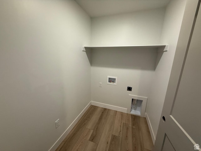 4582 W 3725 S Unit 241, West Haven, UT 84401 - laundry area featuring wood finished floors, hookup for an electric dryer, washer hookup, and baseboards