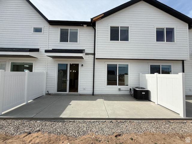 4582 W 3725 S Unit 241, West Haven, UT 84401 - back of house with central air condition unit and a patio area