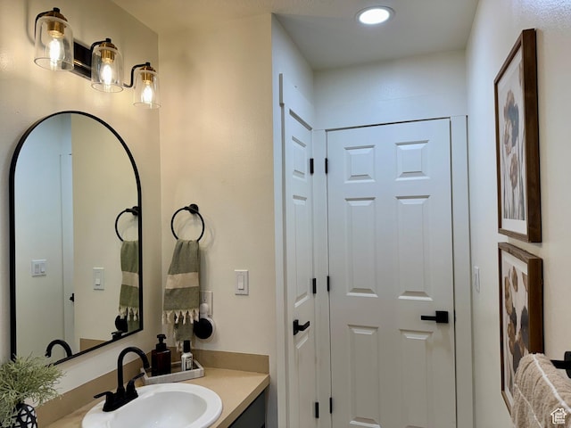 1720 N 2340 W, Lehi, UT 84043 - bathroom with a closet, vanity, and recessed lighting