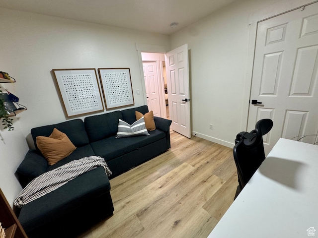 1720 N 2340 W, Lehi, UT 84043 - living area featuring light wood-type flooring and baseboards