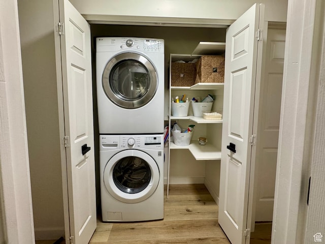 1720 N 2340 W, Lehi, UT 84043 - laundry room featuring estacked washer and dryer and light wood-style floors