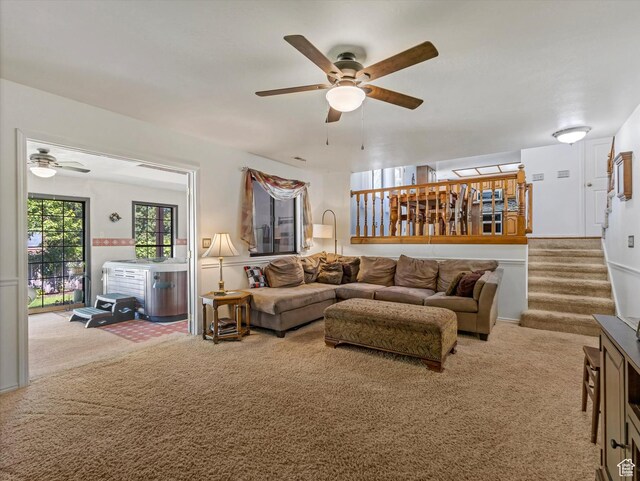 1735 Hayes Dr, Layton, UT 84040 - living area with a ceiling fan, carpet flooring, and stairway