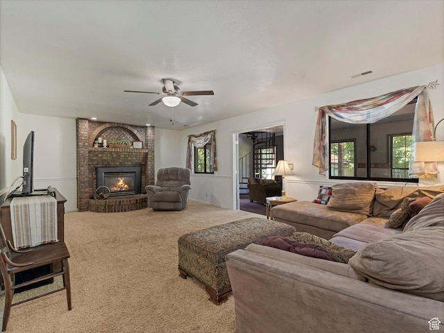 1735 Hayes Dr, Layton, UT 84040 - living area with carpet, ceiling fan, and a fireplace