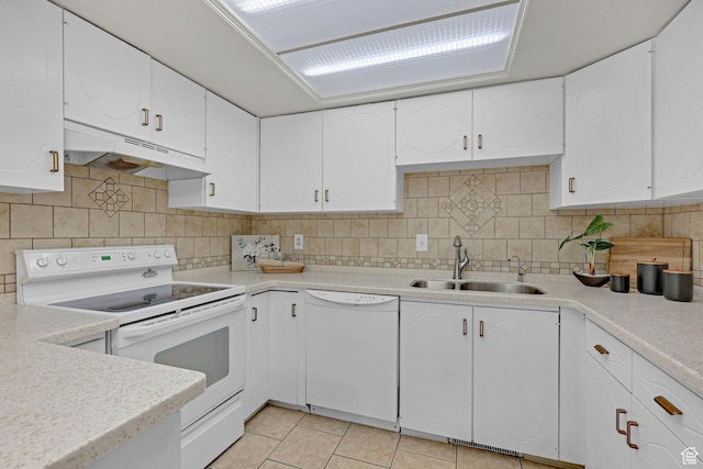 895 E 1015 S, Ogden, UT 84404 - kitchen featuring white appliances, under cabinet range hood, a sink, light countertops, and white cabinetry