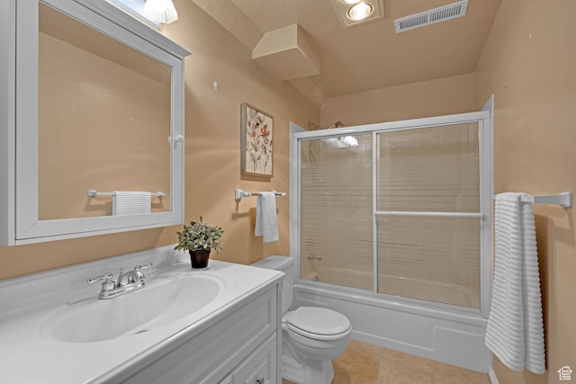 895 E 1015 S, Ogden, UT 84404 - full bath featuring toilet, vanity, tile patterned flooring, and bath / shower combo with glass door
