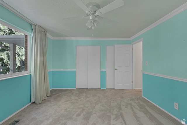895 E 1015 S, Ogden, UT 84404 - unfurnished bedroom with carpet floors, a closet, ornamental molding, ceiling fan, and baseboards