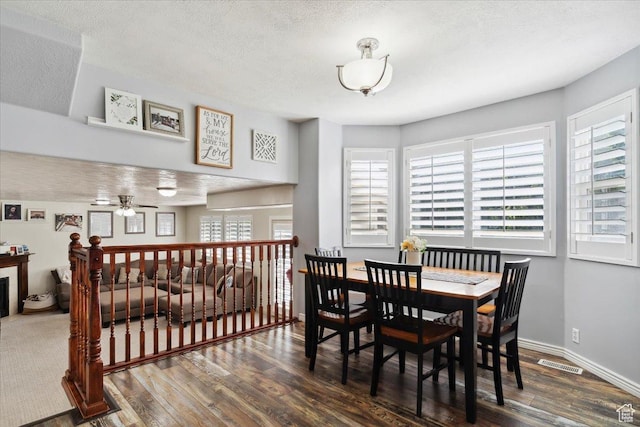 1171 N 900 W, Clinton, UT 84015 - dining space featuring wood finished floors, a ceiling fan, plenty of natural light, a textured ceiling, and baseboards