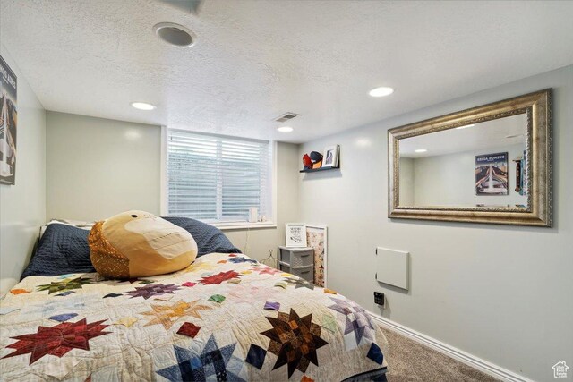 1171 N 900 W, Clinton, UT 84015 - carpeted bedroom with baseboards, a textured ceiling, and recessed lighting