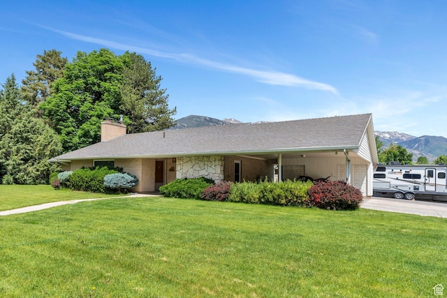 210 N 825 E, American Fork, UT 84003 - ranch-style home with a garage, a front yard, a chimney, concrete driveway, and a mountain view
